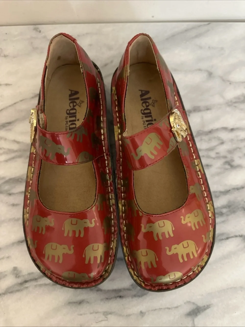 Alegria patent Red leather Mary Jane Platforms with Gold Elephant Accents